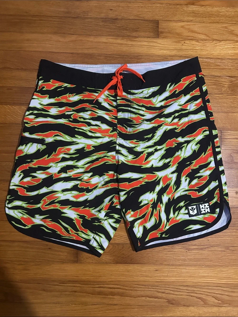Hawaiis Finest Men’s Black Orange and Neon Green Board Shorts SZ 38